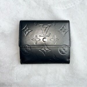 Louis Vuitton wallet monogram engraved print